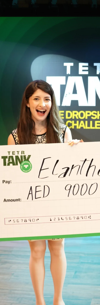 Student pitching on stage